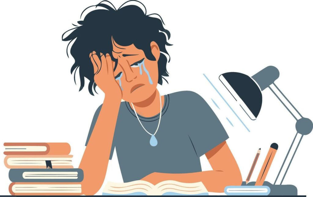un enfant qui pleure sur son bureau