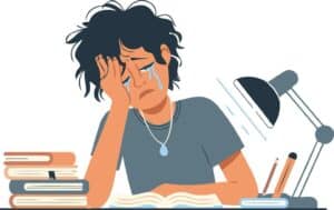 un enfant qui pleure sur son bureau
